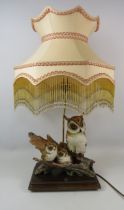 A Belcari Italian Owl figural table lamp with shade, 68cm from base to top of the shade.