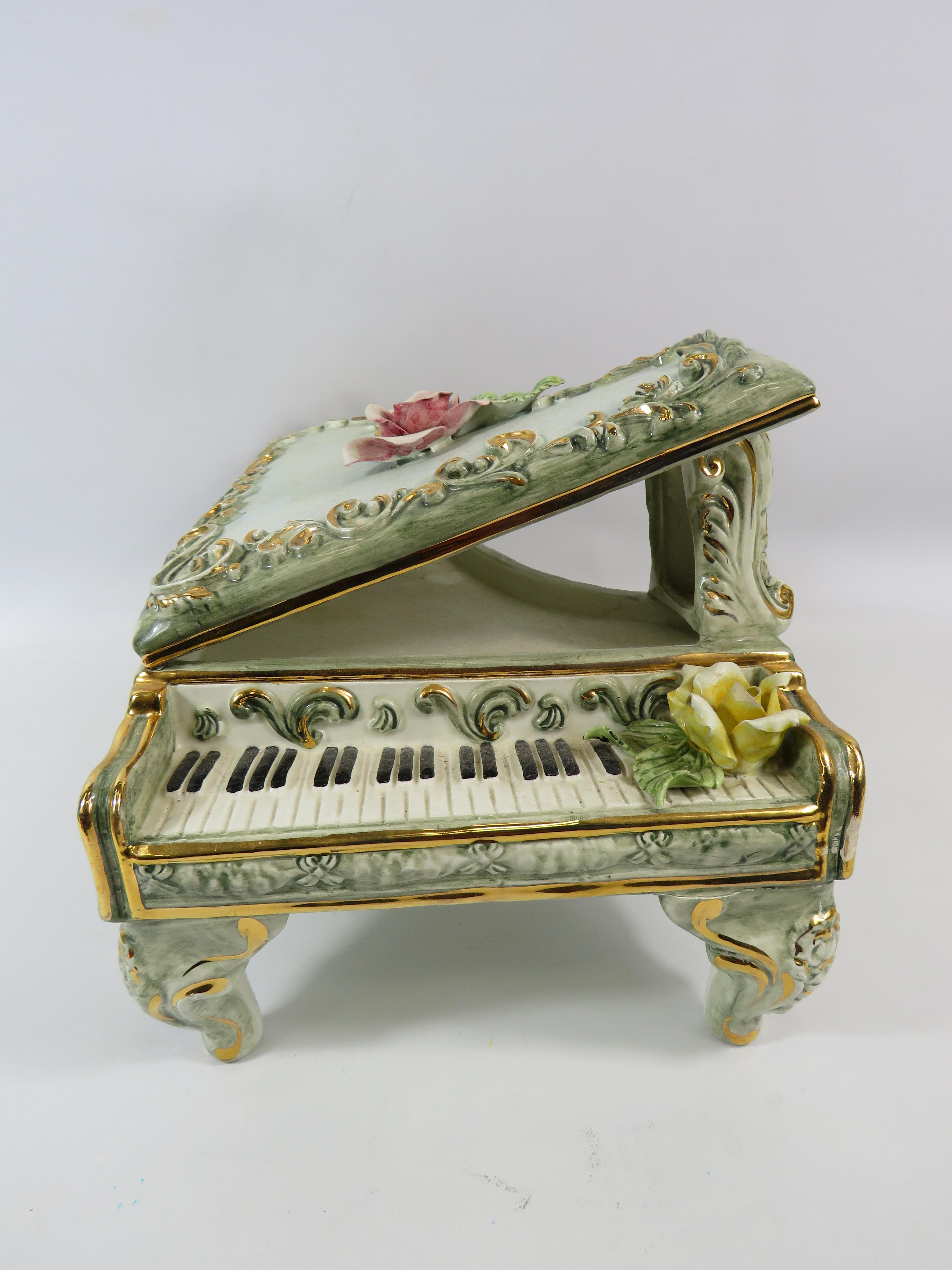 Large Capodimonte grand piano, approx 25cm tall, 26cm wide and 38cm long glued repair to one leg. - Image 4 of 5