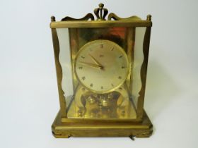 Schatz 1000 day Anniversary clock. Geman made. Comes with Adjustable brass base. In running order bu
