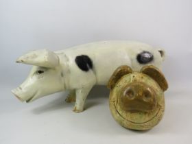 Large Butchers display Pig figure, 25cm tall and 53cm long (repair to ear) plus a pottery pig.