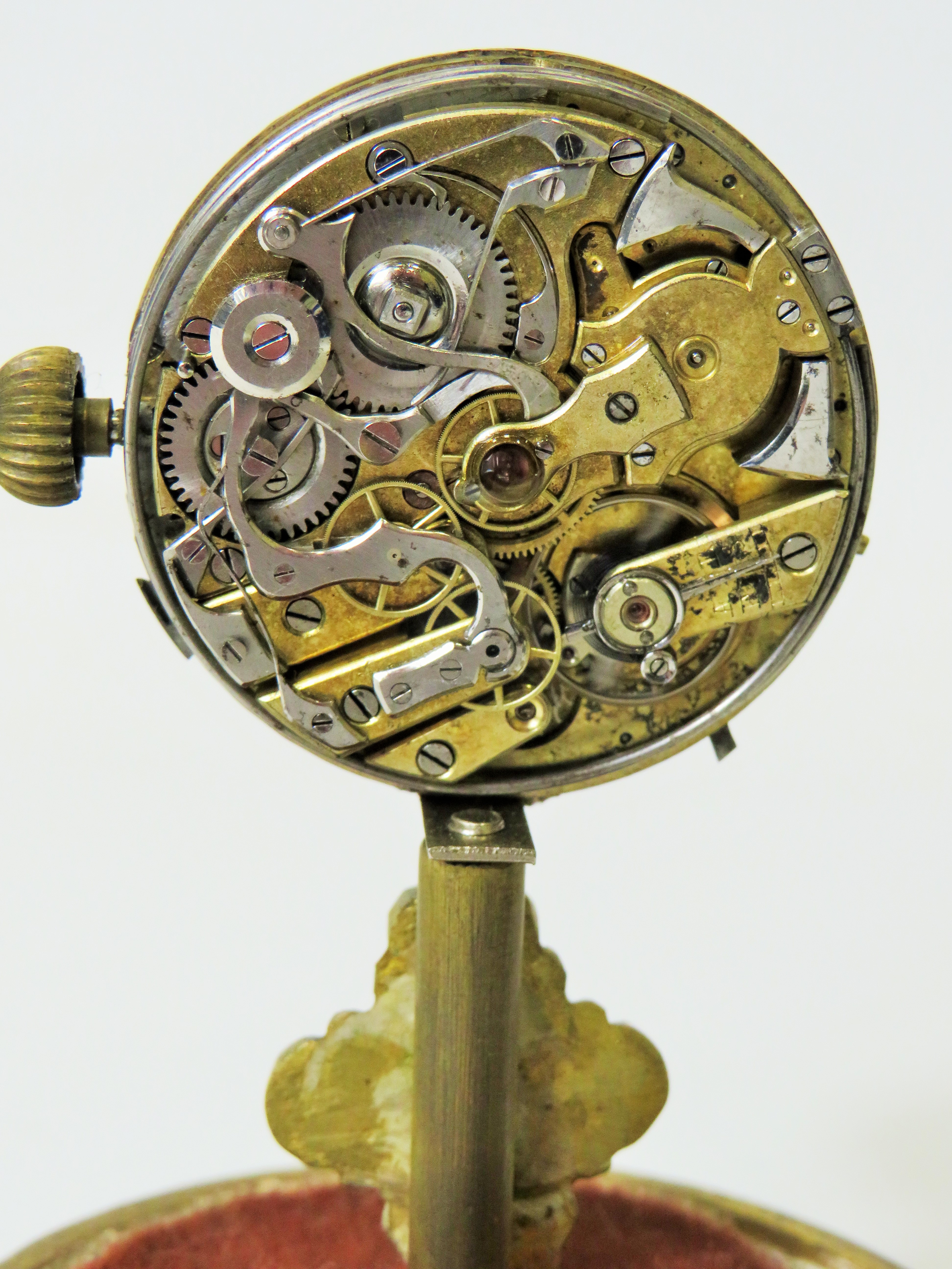 Unusual enamel faced Pocket watch which has been mounted on a brass and wooden stand and under a gla - Image 4 of 4
