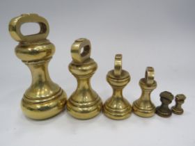 Set of brass bell weights.