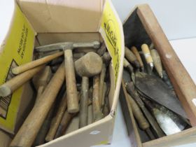 Selection of Vintage Builders trowels in a trug plus a selection of Lump hammers, mallets etc. see p