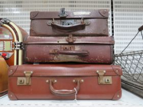 3 Small vinatge suitcases.