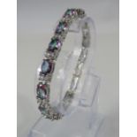 925 silver Mystic topaz and clear gemstone tennis bracelet with extension link.