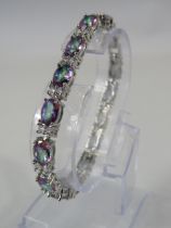 925 silver Mystic topaz and clear gemstone tennis bracelet with extension link.