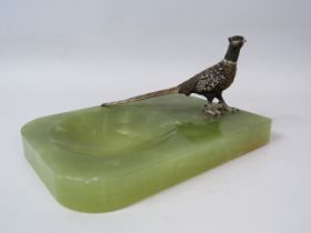 Cold painted bronze pheasant standing on a oynx base 9cm tall, base measures 17cm by 12cm.