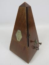 Swiss made metronome by Maelzel in mahogany case in running order. See photos. 