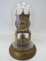 Gustav Becker Brass based Anniversary Clock under a Glass dome. Running order but no key present. Me