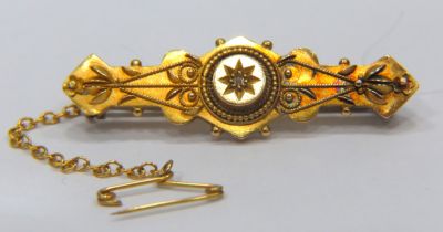 15ct Yellow Gold Antique brooch set with a central small Diamond. Measures 3.1g 40mm long. Metal p