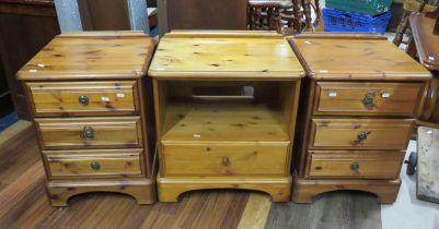 Pair of Dark stained pine bedroom four drawer chests on castors which measures H:24 x W:18 x D:18 in