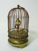 Early 20th Century Gilt metal autonamon clock as a little bird in a cage. Globe hour reader which ro