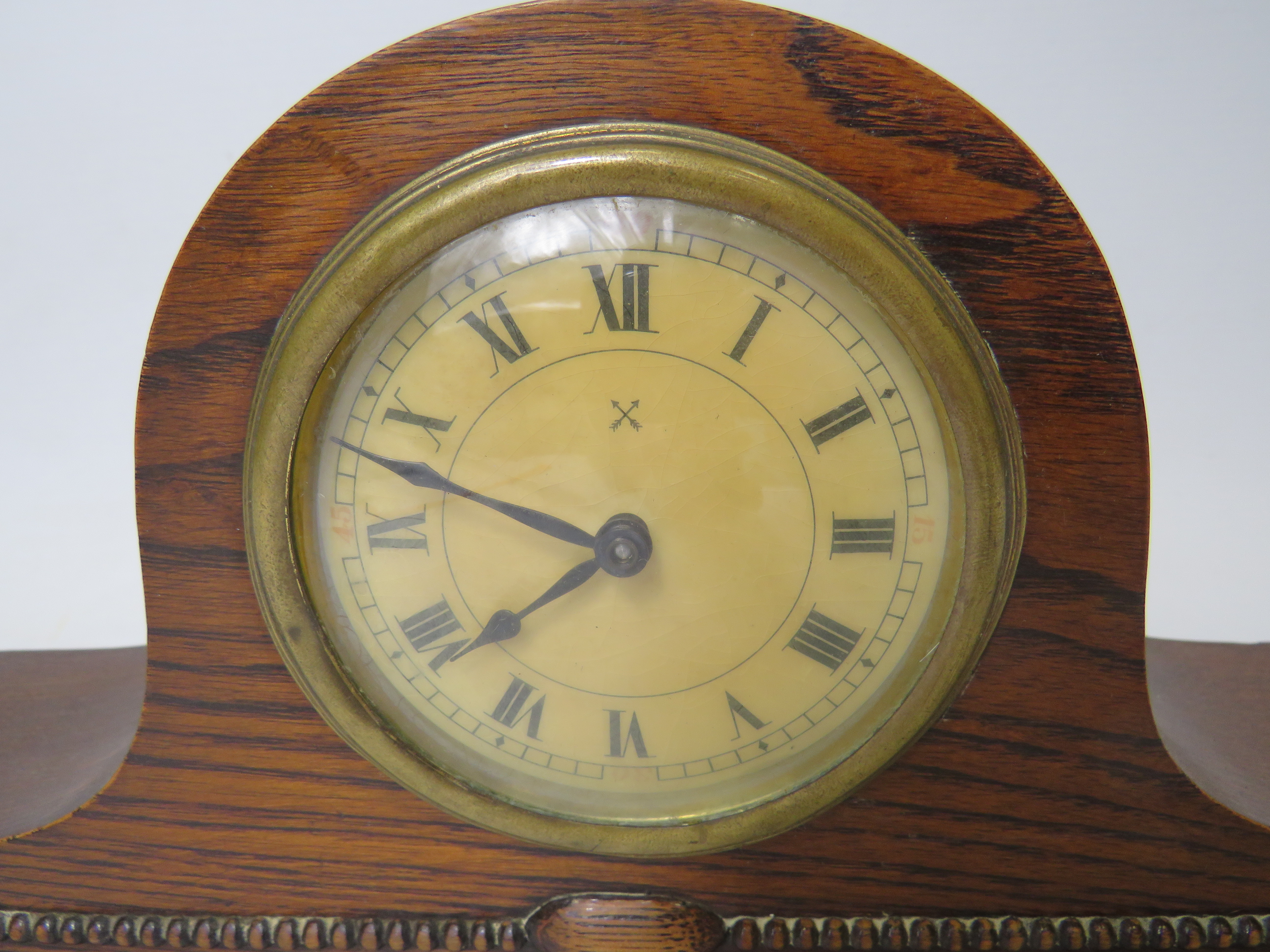 Oak cased mantle clock with ornate carving to the base. Brass mechanism in running order. Measures 1 - Image 2 of 4