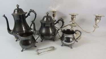 Silver plated teaset and 3 arm candelabra.