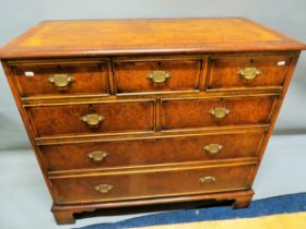 Pretty Georgian style chest of drawers in Walnut Veneer. Raised on Bracket feet . Lovely Condition.