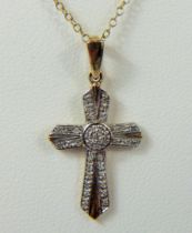 9ct White Gold Crucifix set with Diamonds. Hung on a 19 inch 9ct Yellow Gold Chain. Total weight