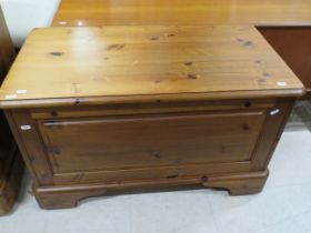 Ducal Knotty pine blanket box with lifting lid and sliding shelf within. Measures H:28 x W:30 inches