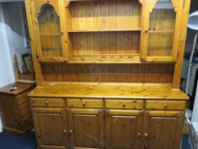 Large Pine Kitchen Dresser with four cupboard doors, drawers above with galleried plate rack with gl