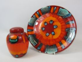 Poole pottery Volcano pattern 21cm plaque and small ginger jar.