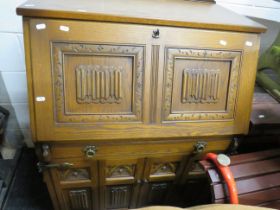 Old Charm Style Computer desk styled as a Vintage Bureau in medium Oak. Measures H:44 x W:34 x D:24