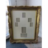 Large ornate gilt picture frame, 29 inch by 23.5 inches.