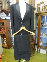 Vintage Moss Bros Convent garden dinner jacket and trousers, estimated size medium.