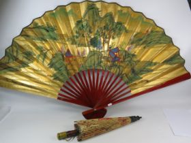 Large chinese handpainted fan approx 75cm long plus a vintage parasol.