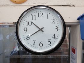 Large Black and White metal Wall Clock with quartz movement. Will need fresh batteries to run. Measu