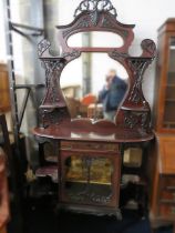 Ornate Darkwood dresser with glass display doors to base. Top half has shaped mirror with ornate cor