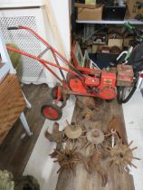 Wolsely Merry Tiller Garden Rotovator . Comes with many ground tillers, plow etc. Petrol Briggs & St