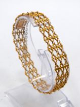 15ct Yellow Gold Four Bar 7 inch Bracelet with safety chain fitted. Total weight 15g