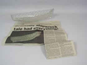 Vintage pressed cane and button glass boat based on the Grace Darling boat, 28cm long. News clipping