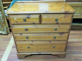 Excellent Ducal Pine chest of drawers in dark pine. Raised on bracket feet it measures H:35 x W:34