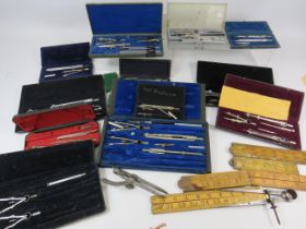 Good mixed lot of Vintage Drawing sets, folding wooden rulers, metal calipers etc. see photos.