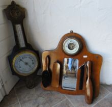 Vintage oak cased barometer and thermometer plus a hall mirror with barometer and clothes brushes.