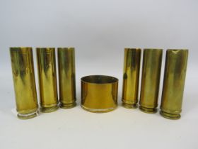 Selection of brass shell cases.