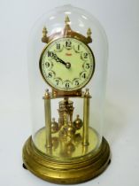 West German Made Kundo Brass based Anniversary Clock. Running order. Adustable height feet. Comes wi