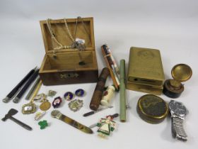 Mixed collectables lot including Enamel badges, travel ink well, George VI savings bank with local