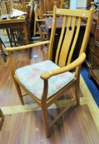 Blonde wood Ercol Armchair. Seat height 19 inches. Back height 37 inches. See photos. S2