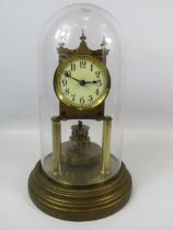 Gustav Becker Brass based Anniversary Clock under a Glass dome. Running order but no key present. Me