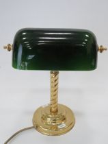 Brass Bankers style lamp with a green glass shade. Working order, measures approx 12 inches tall. Se