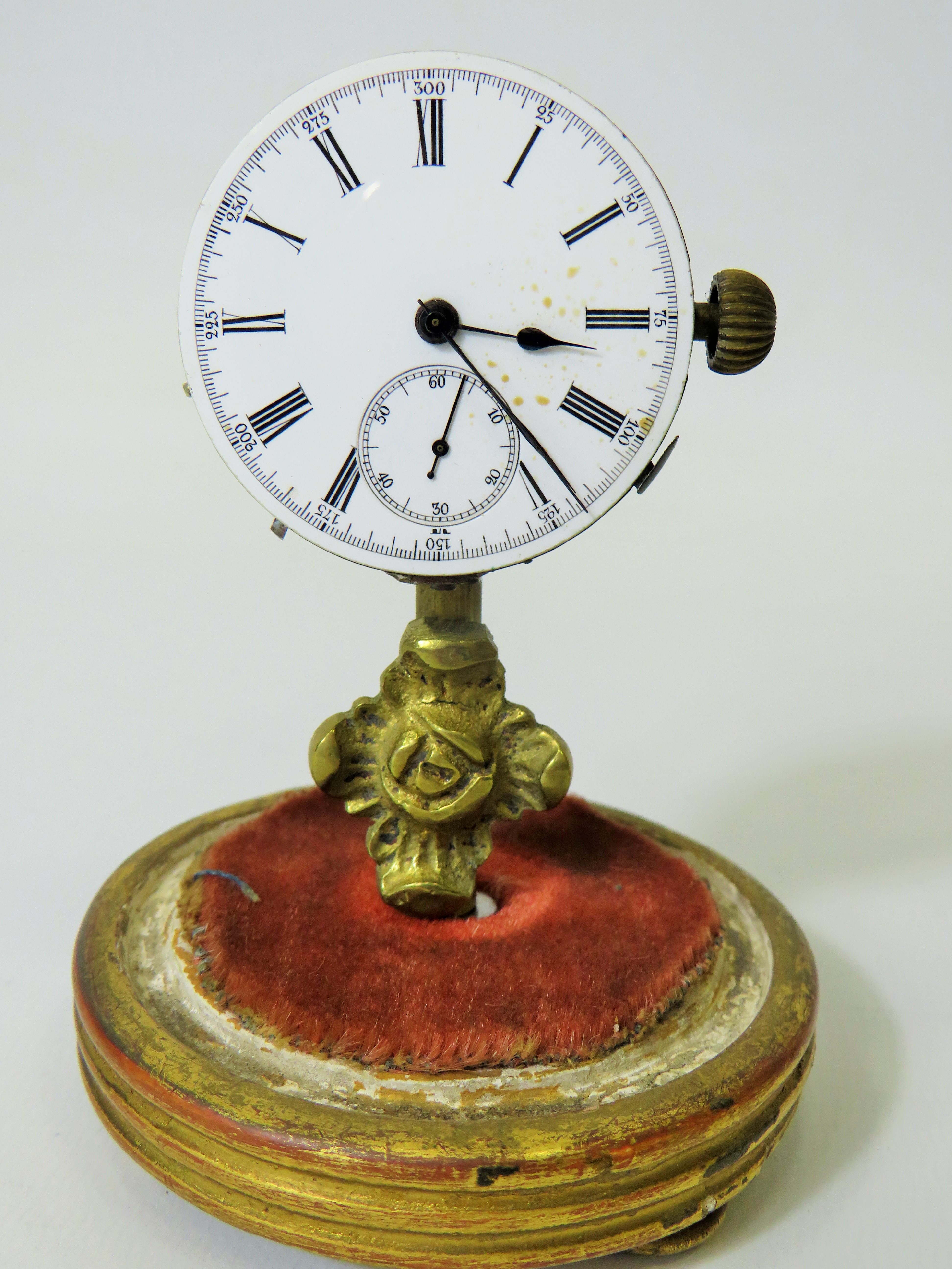Unusual enamel faced Pocket watch which has been mounted on a brass and wooden stand and under a gla - Image 2 of 4