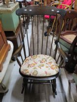 Darkwood Stick Back Rocking chair. Seat Height approx 15 inches, Back Height 41 inches. See photo