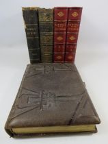 4 Antique books and a vintage leather bound photo album.