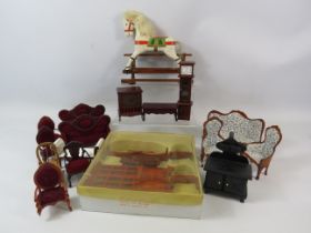 Selection of dolls house furniture and a mini rocking horse.