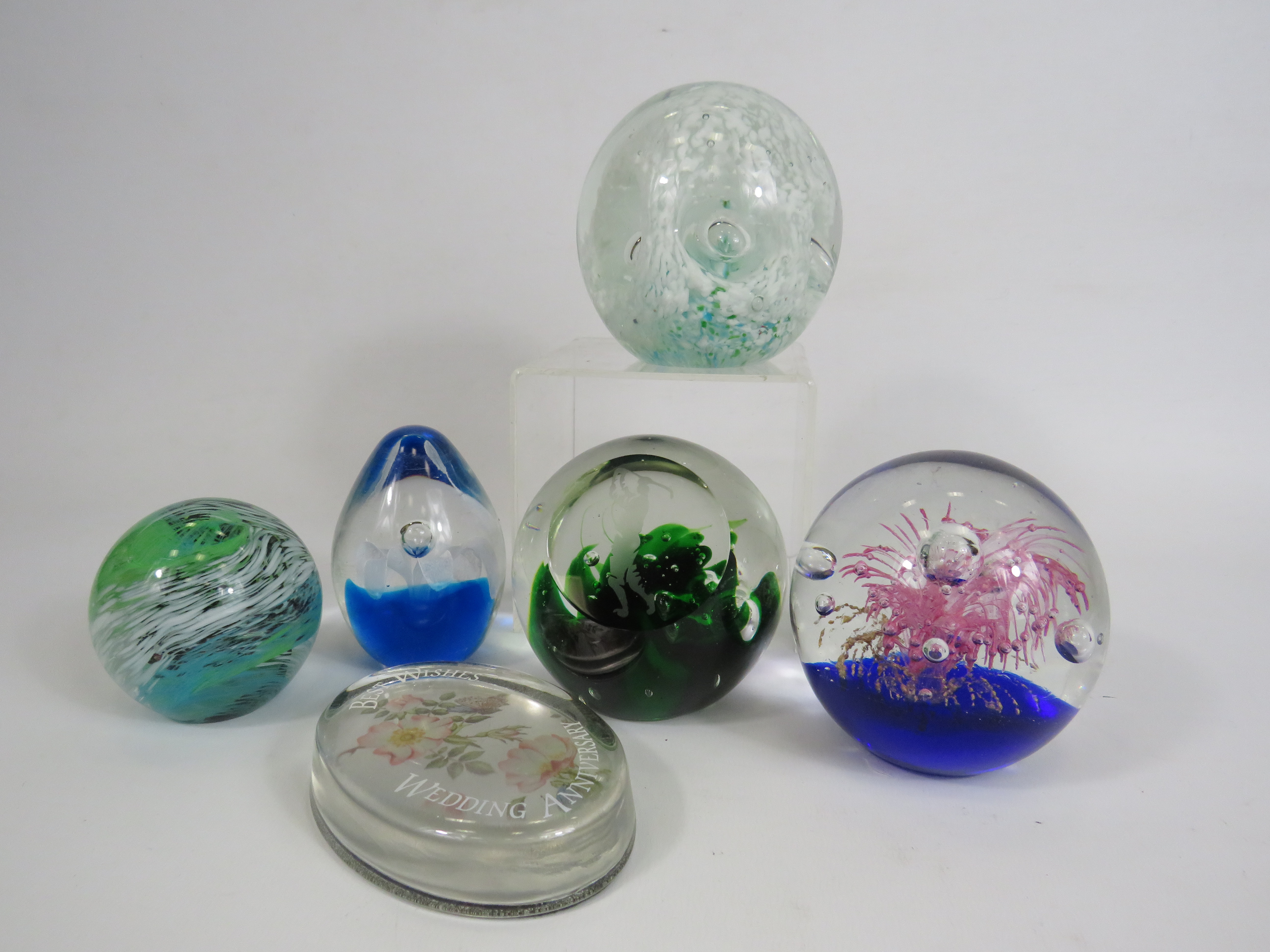 Selection of Art glass paperweights.