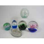 Selection of Art glass paperweights.