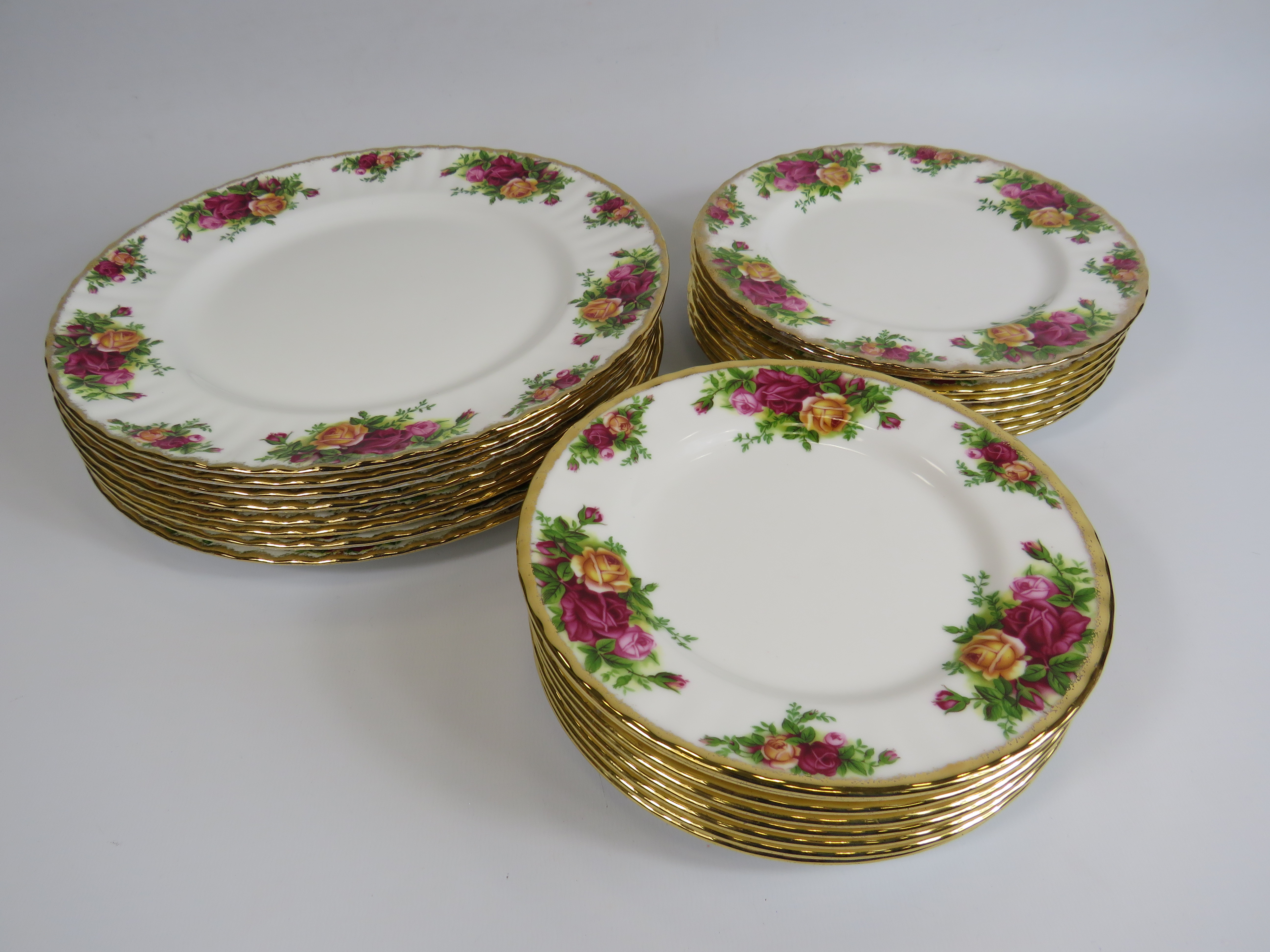 Royal Albert old country roses 8 dinner plates, 8 Salad plates and 8 side plates.