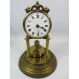 German Made Brass based Anniversary clock with enamel Dial. Sits under a Glass dome which measures