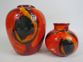 2 Poole pottery Peacock vases, the tallest stands 16cm smaller 10.cm. (One is second quality)